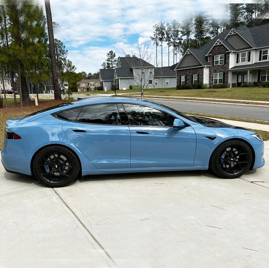 Lexus RC F wrapped in Super Glossy China Blue vinyl wrap side view.