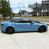 Lexus RC F wrapped in Super Glossy China Blue vinyl wrap side view.