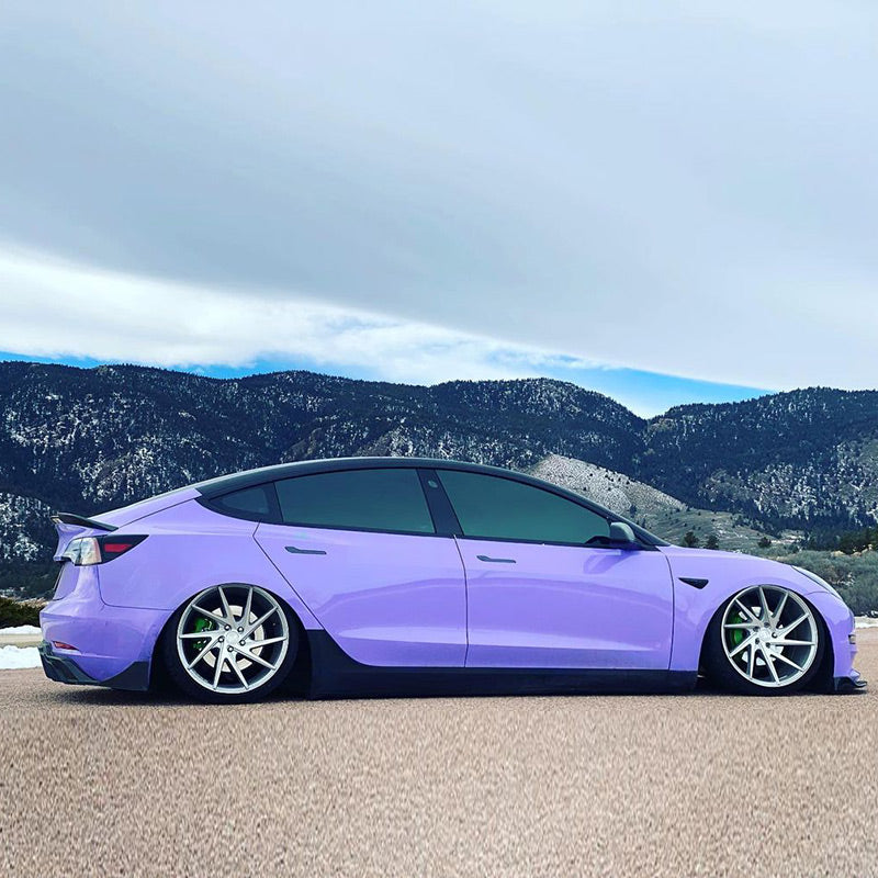 Nissan 350Z wrapped in Super Glossy Lavender Purple vinyl wrap on mountains.