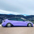 Nissan 350Z wrapped in Super Glossy Lavender Purple vinyl wrap on mountains.