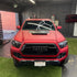 Toyota Tacoma wrapped in Satin Chrome Prismatic Red vinyl wrap front view.