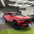 Toyota Tacoma wrapped in Satin Chrome Prismatic Red vinyl wrap.